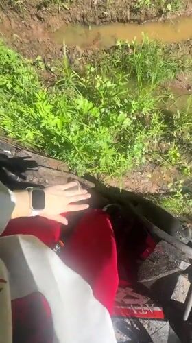 Motorcycle rider stuck in mud near Ilyinsky, Russia