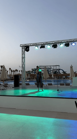 Resort entertainment: outdoor performance and guest activities in Al Ahia'