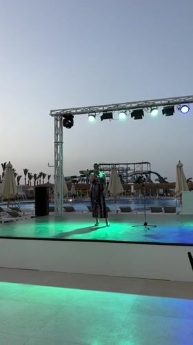 Resort entertainment: outdoor performance and guest activities in Al Ahia'