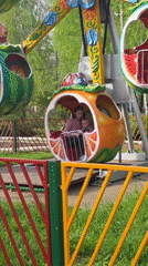 Family enjoys afternoon at amusement park in Chaikovsky