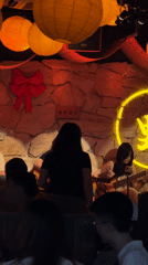 Evening street life and live music captured across Chinese districts