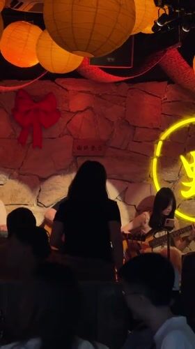 Evening street life and live music captured across Chinese districts