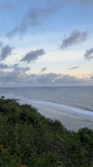 Cliffside ocean views captured during sunrise in Ungasan, Indonesia
