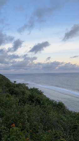 Cliffside ocean views captured during sunrise in Ungasan, Indonesia