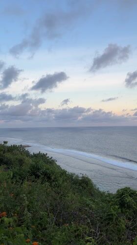Cliffside ocean views captured during sunrise in Ungasan, Indonesia