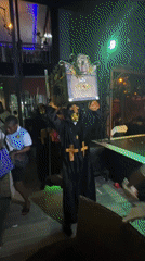 Ceremonial procession and nighttime celebration observed in Obosi, Nigeria