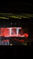 Live concert with multiple performers captured in Medellín
