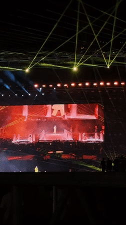 Live concert with multiple performers captured in Medellín