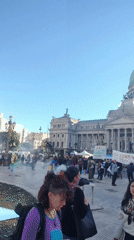 Protesters gather with banner in Buenos Aires demonstration