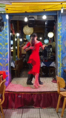 Tango performance and art browsing captured in colorful Buenos Aires