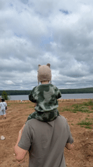 Morning waterfront gathering documented in Chaikovsky, Russia
