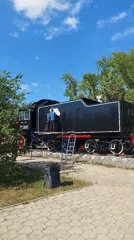 Summer day in Komsomolsk-on-Amur: parks, flowers, and a steam locomotive