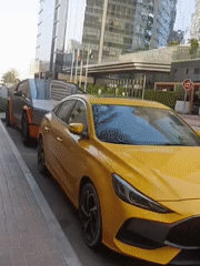 Dubai street scenes show mixed vehicles, construction activity