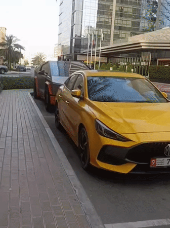 Dubai street scenes show mixed vehicles, construction activity