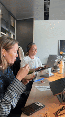 London office workers multitask during lunch break