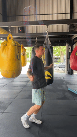 Post-sparring scene at a Chalong boxing gym