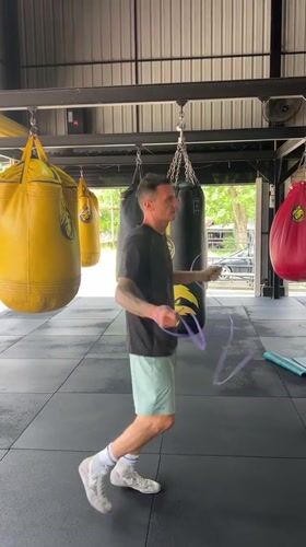 Post-sparring scene at a Chalong boxing gym