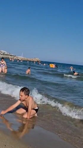 Busy summer beach day on the Bulgarian Black Sea coast