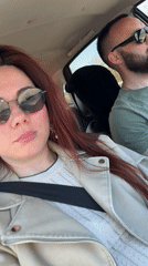 Woman passenger observed in vehicle interior in Russia
