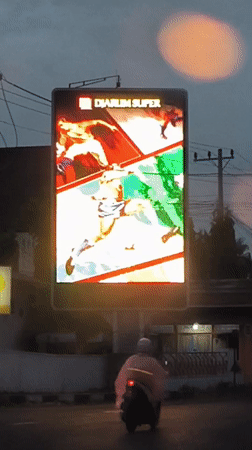 Ordinary life moments documented across Indonesian city during evening hours