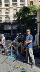 Street musicians perform near central Buenos Aires church Friday afternoon