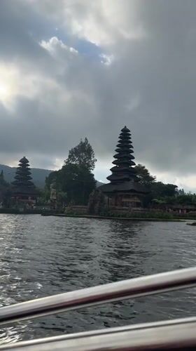 Morning recreation at Lake Beratan temple complex in Bali