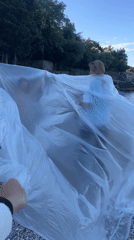 Photography session with plastic sheets on Montenegro beach