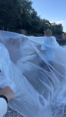 Photography session with plastic sheets on Montenegro beach