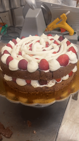 Fresh baked goods and cake preparation in Italian bakery