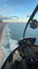 Helicopter flight documents Rio de Janeiro coastal views from above