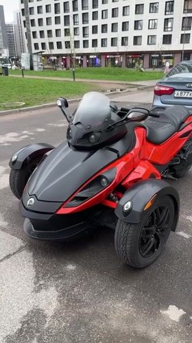 Can-Am Spyder motorcycle parked in Murino residential area