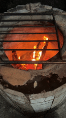 Flatbread preparation documented at tandoor oven in Kartubani, Georgia