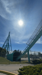 Roller coaster filmed against blue sky in Vaughan