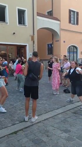 Pride festival and street life along Regensburg's Danube waterfront