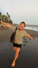 Barefoot runner spotted on Cemagi beach carrying phone