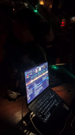 Nightclub Scene Captured in Liangjiang with DJ, Dancing, Sports TV