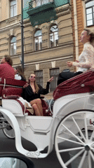 Horse-drawn carriage ride through Saint Petersburg streets