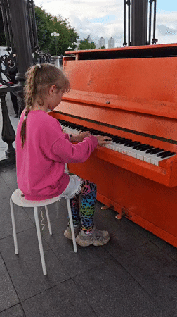 Street art, signage, and a piano moment in Yekaterinburg