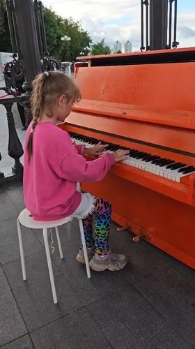 Street art, signage, and a piano moment in Yekaterinburg