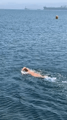 Swimmers enjoy clear waters around A Coruña waterfront