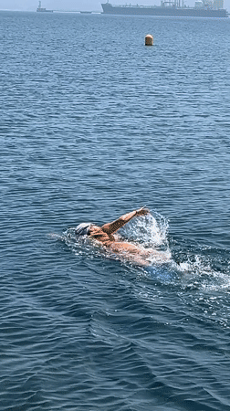 Swimmers enjoy clear waters around A Coruña waterfront
