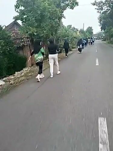 Community running event observed in Sambirejo, Indonesia late evening