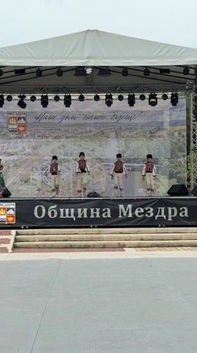 Children perform traditional folk dances at cultural event in Bulgaria