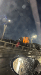 Nighttime driving through rain recorded in Cheboksary, Russia