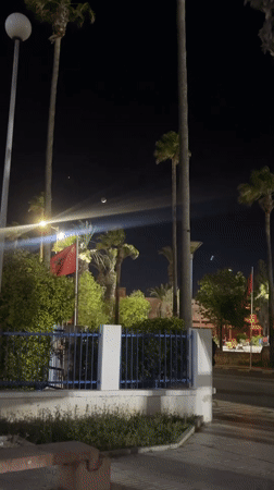 Evening skate park activity captured under crescent moon in Safi