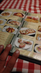 Evening out at a Sutomore bar, beers and menus on the table