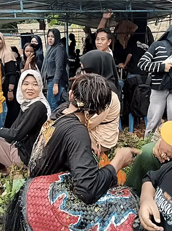 Traditional ceremonial gathering observed in Kuto, Indonesia