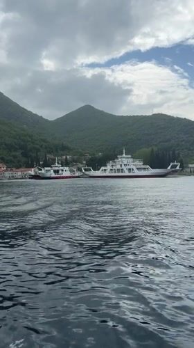 Ferry operations documented at Montenegro's Bay of Kotor terminal