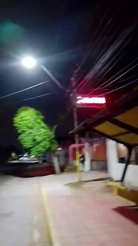 Nighttime pedestrian activity recorded near Venezuelan bus stop