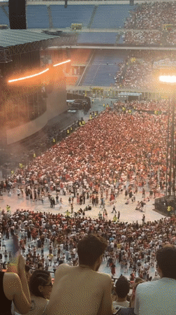 Packed stadium concert lights up Milan on a July evening